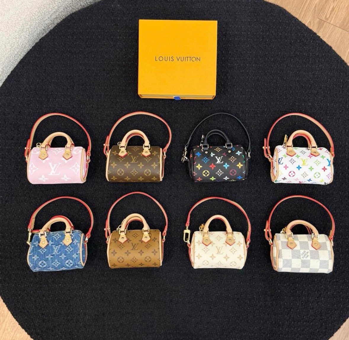 LV Speedy Coin Purses